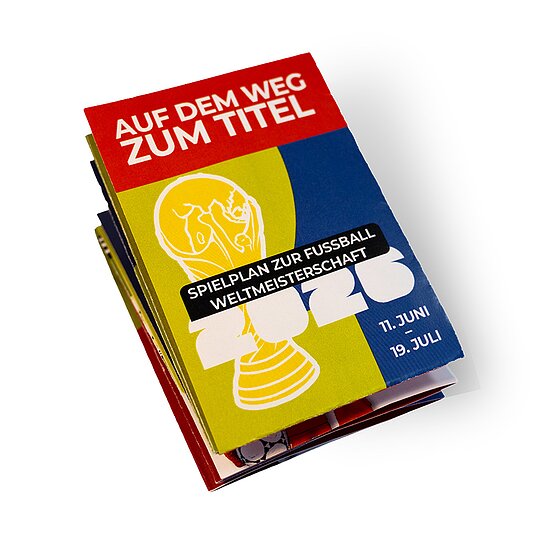 "Auf dem Weg zum Titel" - Spielplan zur WM 26, Deutsch